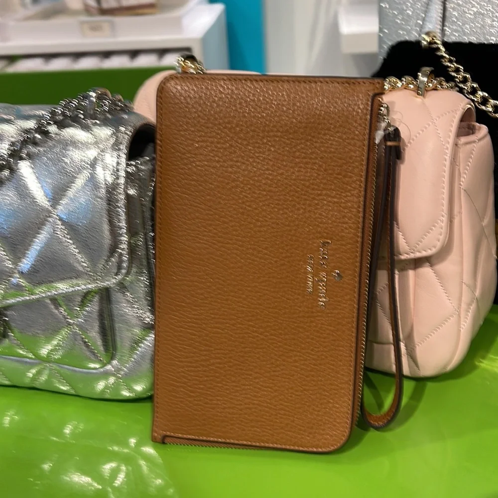 Kate Spade Medium Lucy L-Zip Wristlet Pebble Leather 

Warm Gingerbread 
NWT - Picture 4 of 16